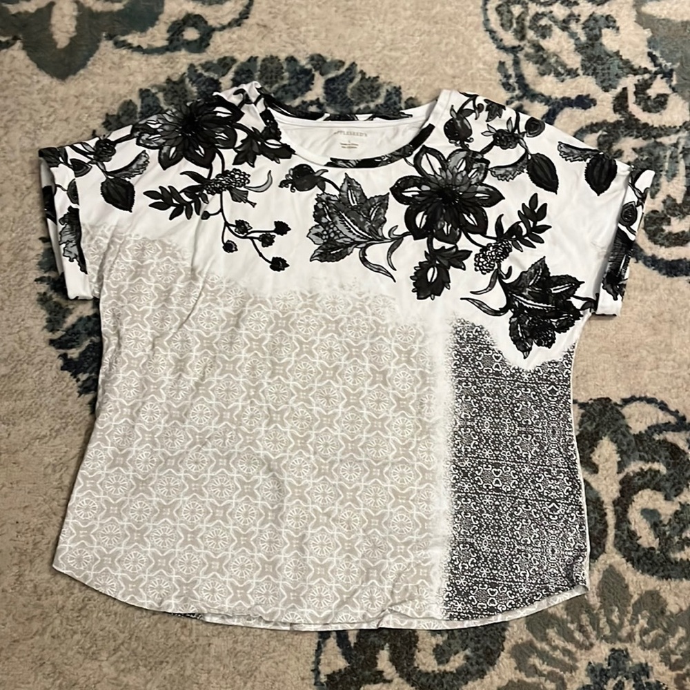 Appleseed’s shirt